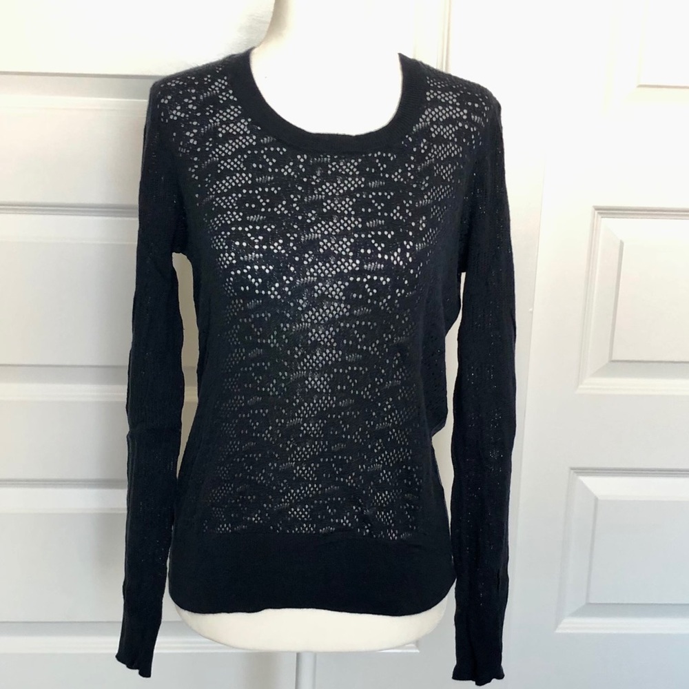 Very feminine lightweight sweater.